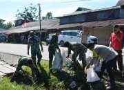 Peduli Lingkungan, Anggota Kodim 1710/Mimika Gelar Karya Bakti di Pasar Jiliale